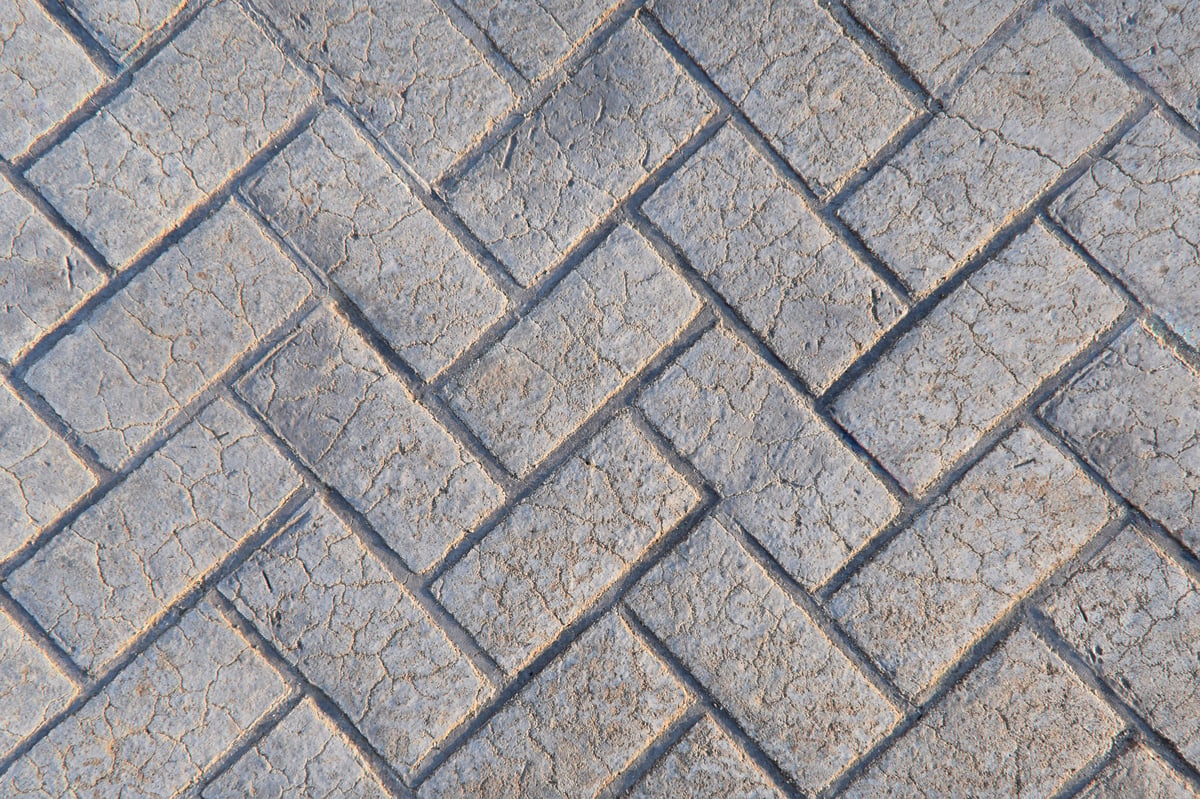 Finished stamped brick patio concrete surface