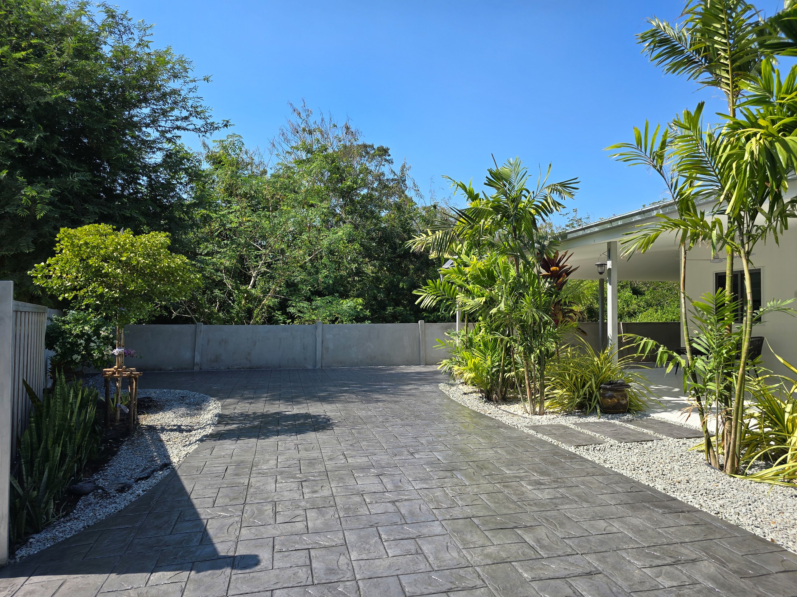 Stamped brick pattern concrete driveway