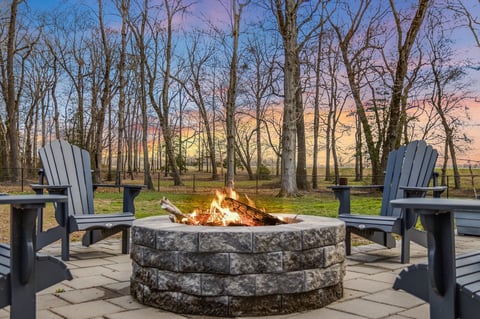Patio with fire pit and outdoor seating area