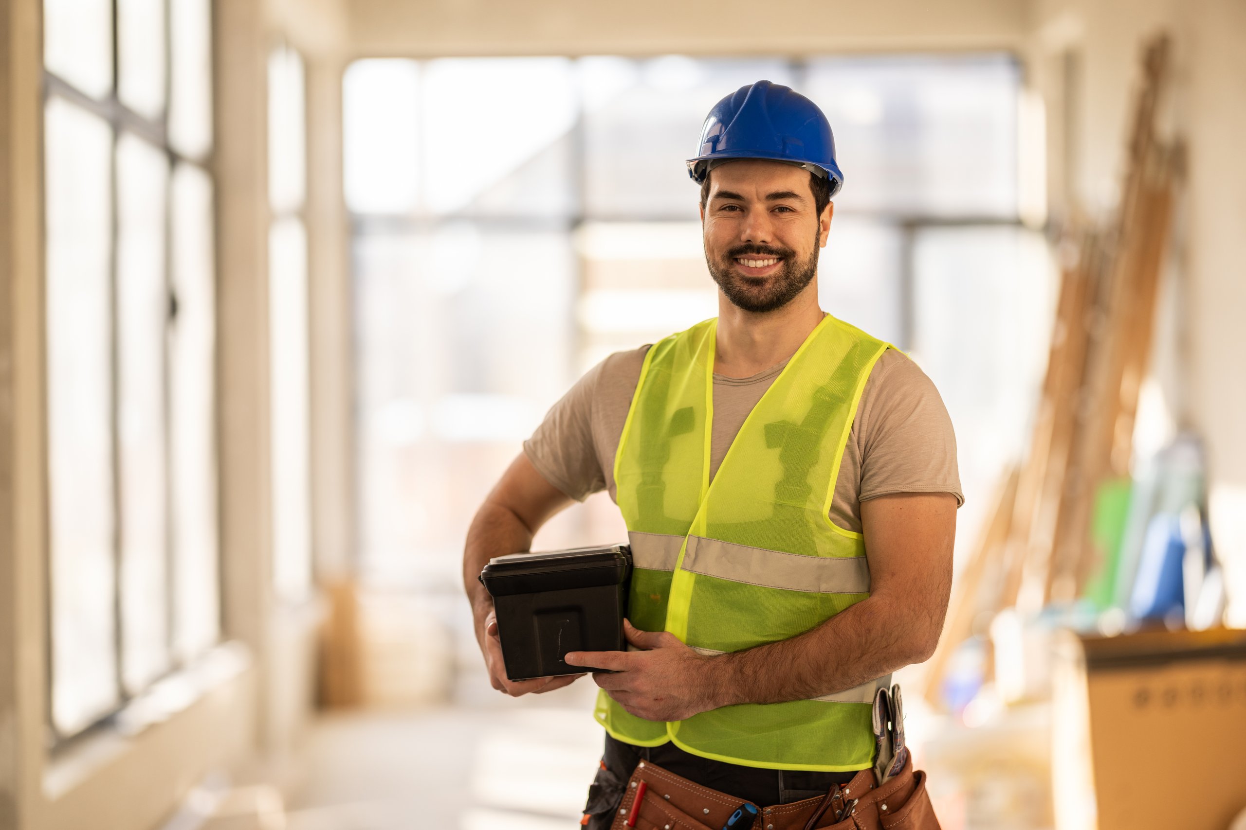 Professional contractor with hard hat ready for work