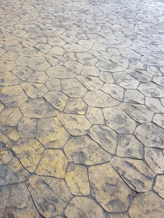 Herringbone brick stamped concrete pattern